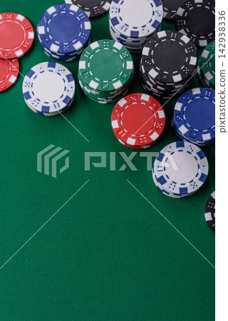 Multi colored gaming chips for betting in casino games. Betting chips 142938336