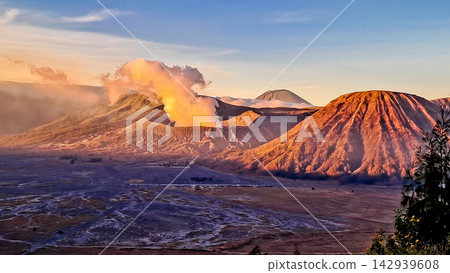 Beautiful morning view of Mount Bromo and Mount Semeru in East Java, Indonesia. Beautiful morning view of Mount Bromo and Mount Semeru in East Java, Indonesia. 142939608