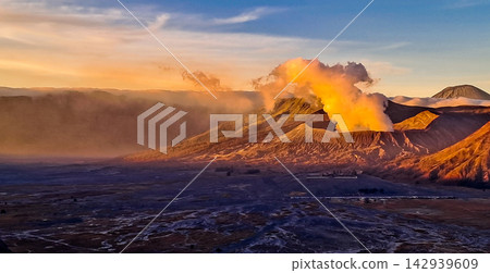 Beautiful morning view of Mount Bromo and Mount Semeru in East Java, Indonesia. Beautiful morning view of Mount Bromo and Mount Semeru in East Java, Indonesia. 142939609