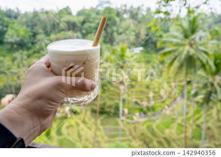 October 20, 2024, Inni Island: A first-person perspective special photo with the background of a glass of ice cream. 142940356