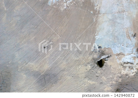 Weathered Gray Concrete Wall Surface with Rough Texture and Hole 142940872