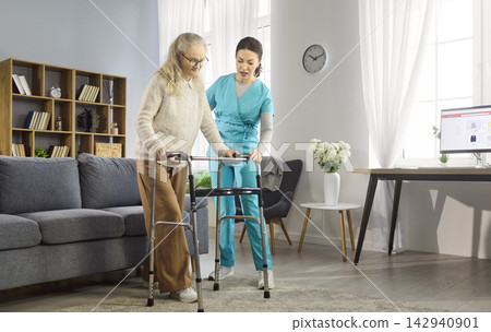 Caregiver nurse aiding elderly woman with walker during home rehabilitation care Caregiver nurse aiding elderly woman with walker during home rehabilitation care 142940901
