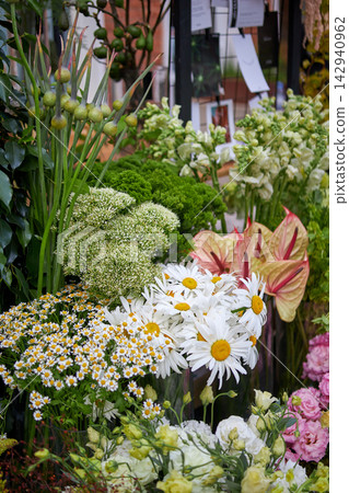 Stalls with flowers and bouquets at local street market Stalls with flowers and bouquets at local street market 142940962
