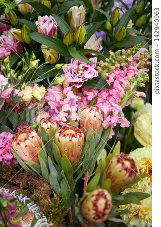 Stalls with flowers and bouquets at local street market Stalls with flowers and bouquets at local street market 142940963