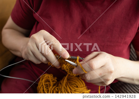 Slow knitting for quiet leisure away from a phone Slow knitting for quiet leisure away from a phone 142941928