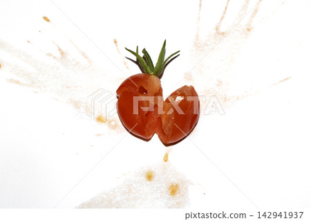 A squashed splattered and crushed broken fresh tomato with seeds A squashed splattered and crushed broken fresh tomato with seeds 142941937