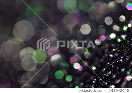 Bokeh sparkly festive black gothic glitter style background sexy fishnet tights 142942046