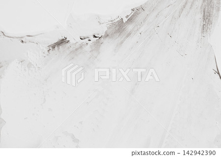 Textured white canvas background displaying broad brush strokes over dark underlayer designed for contemporary art background or modern interior wall plaster effect Textured white canvas background displaying broad brush strokes over dark underlayer designed for contemporary art background or modern interior wall plaster effect 142942390