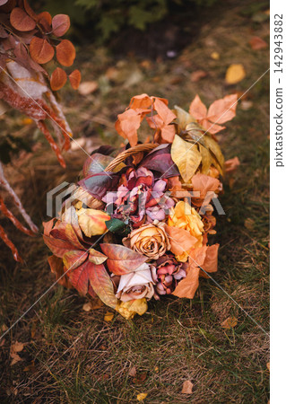 Autumn Basket with Dried Flowers and Leaves Autumn Basket with Dried Flowers and Leaves 142943882