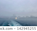Boat Water Wake Trail on Ocean in Heavy Fog 142945255