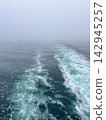 Boat Water Wake Trail on Ocean in Heavy Fog 142945257