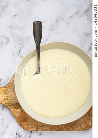 Mashed potatoes, with suluguni cheese, homemade, on a marble table, no people, top view, Mashed potatoes, with suluguni cheese, homemade, on a marble table, no people, top view, 142945831