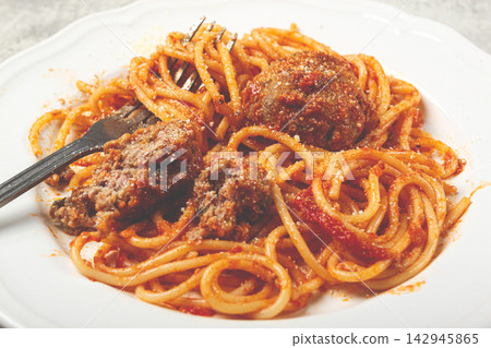 spaghetti with meatballs in tomato sauce, on a white plate, no people, homemade, spaghetti with meatballs in tomato sauce, on a white plate, no people, homemade, 142945865