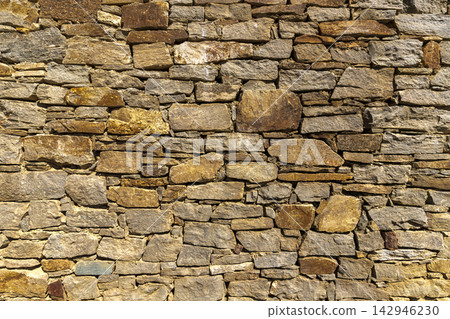 The surface of an stone wall The surface of an stone wall 142946230
