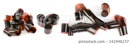 Vintage Brown Photographic Film Negatives and Curled 35mm Film Strips Isolated on Clean White Background for Photography Creative Design Projects Vintage Brown Photographic Film Negatives and Curled 35mm Film Strips Isolated on Clean White Background for Photography Creative Design Projects 142946237