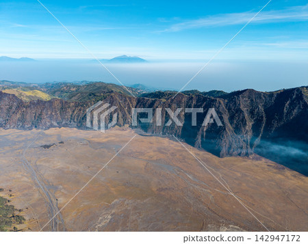 Aerial Sunrise Over Mount Bromo Volcanic Caldera Landscape Aerial Sunrise Over Mount Bromo Volcanic Caldera Landscape 142947172
