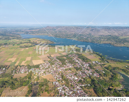 Aerial Landscape of Sumberpucung Farmland, Lakes, Villages, and Forested Hills 142947262