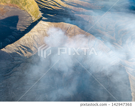 Aerial Mount Bromo Crater and Volcanic Caldera Landscape Aerial Mount Bromo Crater and Volcanic Caldera Landscape 142947368