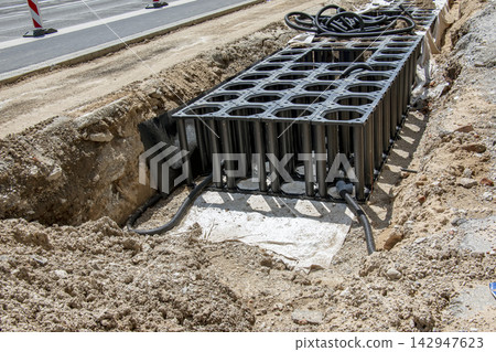 Underground Drainage Modules and Utility Pipes in Excavation Underground Drainage Modules and Utility Pipes in Excavation 142947623
