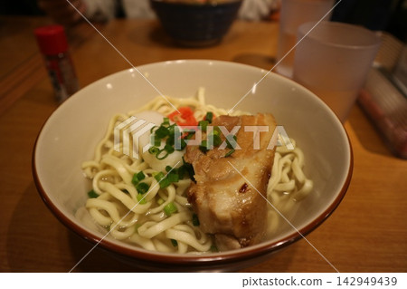 Okinawan soba noodles topped with pork belly Okinawan soba noodles topped with pork belly 142949439