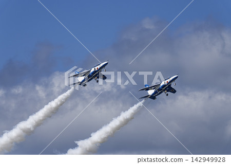 Blue Impulse aerobatic team at Matsushima Air Base conducts flight training under the autumn blue sky in Higashimatsushima City, Miyagi Prefecture. Blue Impulse aerobatic team at Matsushima Air Base conducts flight training under the autumn blue sky in Higashimatsushima City, Miyagi Prefecture. 142949928