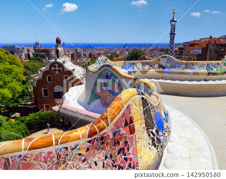Panoramic View from Park Guell Terrace with Mosaic Bench and Barcelona Cityscape Panoramic View from Park Guell Terrace with Mosaic Bench and Barcelona Cityscape 142950580
