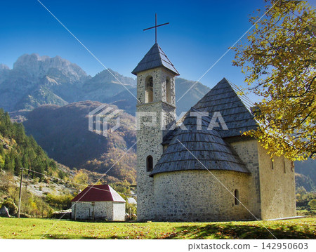 Historic Stone Church in Theth Village, Albania with Autumn Mountains Historic Stone Church in Theth Village, Albania with Autumn Mountains 142950603
