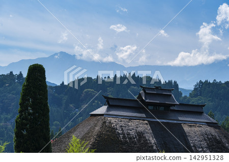 Mount Kashima and thatched roofs Mount Kashima and thatched roofs 142951328
