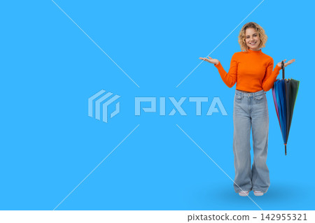 Individual enjoys vibrant weather while showcasing an umbrella Individual enjoys vibrant weather while showcasing an umbrella 142955321