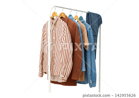 Autumn clothing. Casual clothing displayed neatly on a rack, highlighting autumn styles, PNG Autumn clothing. Casual clothing displayed neatly on a rack, highlighting autumn styles, PNG 142955626