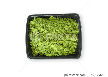Matcha. Bright green matcha powder is showcased in a black container. PNG Matcha. Bright green matcha powder is showcased in a black container. PNG 142955650