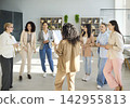 Diverse businesswomen team in office during coaching workshop discussion session 142955813