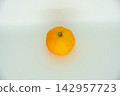 Fresh oranges against a white background 142957723