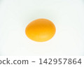 A simple egg floating on a white background. 142957864