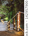 Bamboo lanterns illuminate the night road 142957900