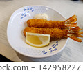 Two fried shrimp (with lemon and tartar sauce) Two fried shrimp (with lemon and tartar sauce) 142958227