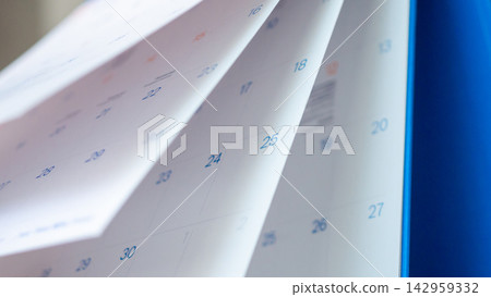 Abstract blur calendar page flipping sheet close up background business schedule planning appointment meeting concept Abstract blur calendar page flipping sheet close up background business schedule planning appointment meeting concept 142959332
