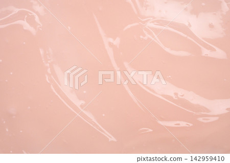 Pink lotion beauty skincare cream texture cosmetic product background Pink lotion beauty skincare cream texture cosmetic product background 142959410