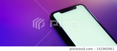 Close up of modern mobile phone with white empty blank display Close up of modern mobile phone with white empty blank display 142960961