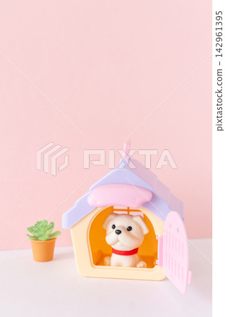 A dog sitting in a pet house/kennel. A dog sitting in a pet house/kennel. 142961395