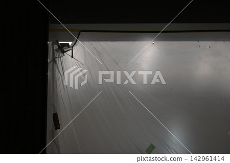 Construction work inside buildings carried out at night Construction work inside buildings carried out at night 142961414