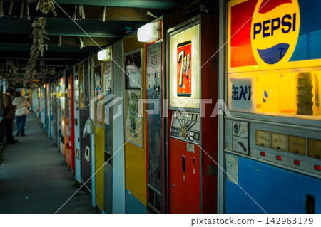 A nostalgic Showa-era retro space lined with colorful retro vending machines in Sagamihara. A nostalgic Showa-era retro space lined with colorful retro vending machines in Sagamihara. 142963179