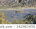 Fishing boats moored along the shore of Lake Bafa in Turkey. Selective Focus. 142963456