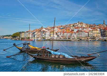 Porto rabelo boats on Douro River by Ribeira, Portugal heritage view 142963904