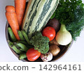 Fresh vegetables in a rustic bowl 142964161