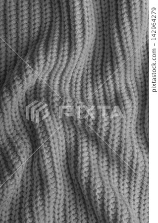 Gray knitted fabric texture with folds, wrinkles and soft waves, crumpled wool background Gray knitted fabric texture with folds, wrinkles and soft waves, crumpled wool background 142964279