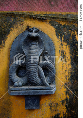 A little monument with cobra snake in Gokarna - Karnataka A little monument with cobra snake in Gokarna - Karnataka 142964560