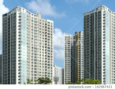 Modern High-Rise Apartment Buildings in a South Korean Residential Complex Modern High-Rise Apartment Buildings in a South Korean Residential Complex 142967431