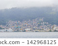 Mountains with favelas houses tropical nature Angra dos Reis Brazil. 142968125
