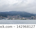 Mountains with favelas houses tropical nature Angra dos Reis Brazil. 142968127